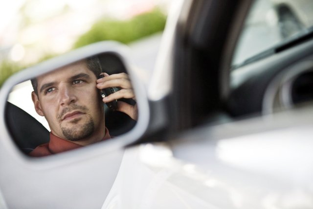 Man calling one of our automotive repair specialists in Kerrville, TX